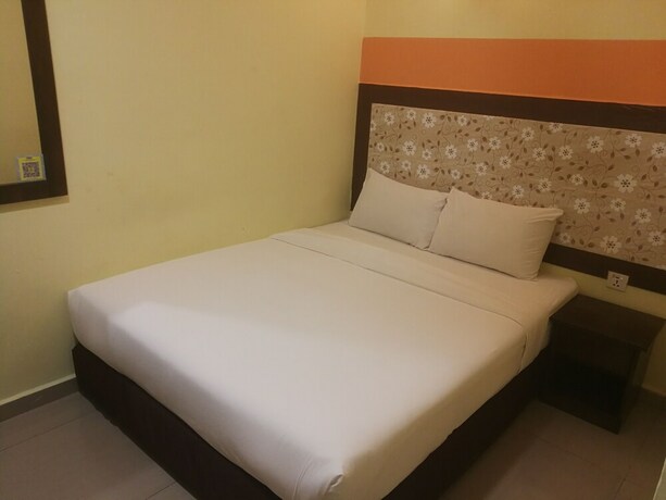 Imagen de la habitación del Hotel Sun Inns Permas Jaya. Foto 21