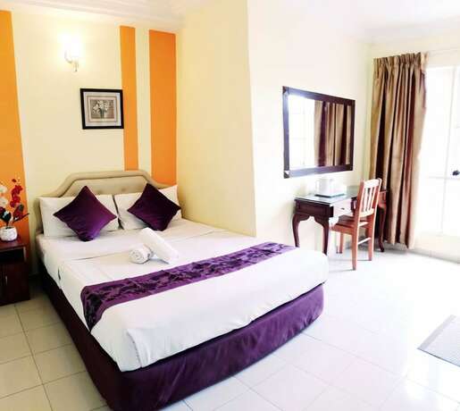 Imagen de la habitación del Hotel Sun Inns Permas Jaya. Foto 24