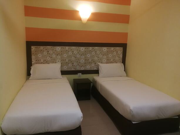 Imagen de la habitación del Hotel Sun Inns Permas Jaya. Foto 34