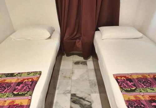 Imagen de la habitación del Hotel Sun Inns Skudai. Foto 13
