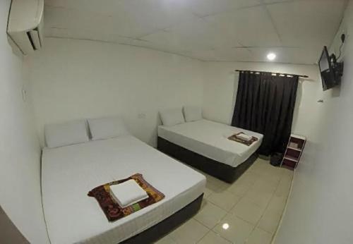 Imagen de la habitación del Hotel Sun Inns Skudai. Foto 18