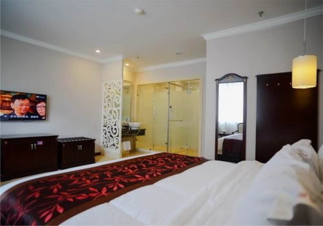 Imagen de la habitación del Hotel Sun Island Holiday Shenzhen. Foto 2