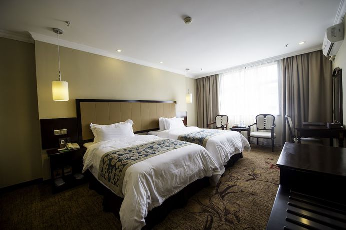 Imagen de la habitación del Hotel Sun Island Holiday Shenzhen. Foto 7
