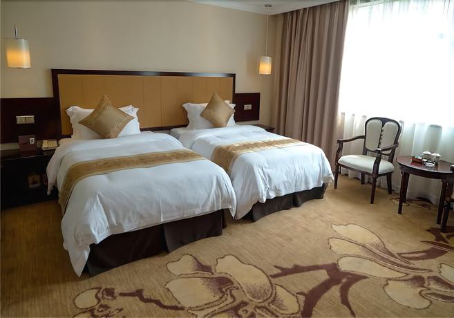 Imagen de la habitación del Hotel Sun Island Holiday Shenzhen. Foto 11