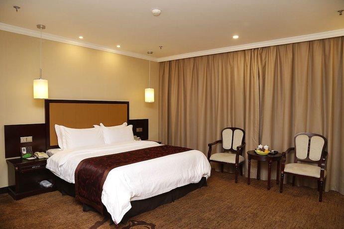 Imagen de la habitación del Hotel Sun Island Holiday Shenzhen. Foto 12