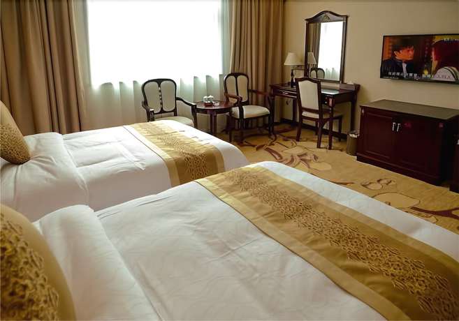 Imagen de la habitación del Hotel Sun Island Holiday Shenzhen. Foto 14