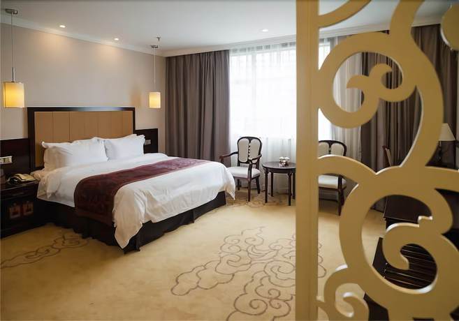 Imagen de la habitación del Hotel Sun Island Holiday Shenzhen. Foto 17