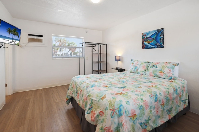 Imagen de la habitación del Hotel Sun Island Motel. Foto 2