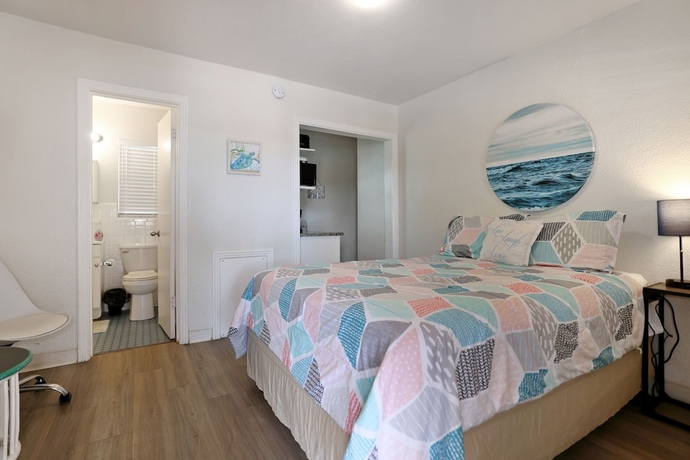 Imagen de la habitación del Hotel Sun Island Motel. Foto 8