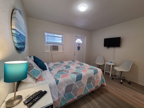 Imagen de la habitación del Hotel Sun Island Motel. Foto 9