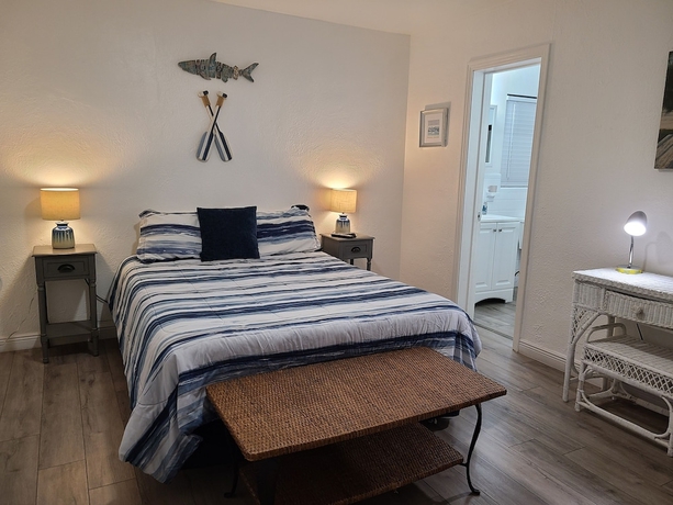 Imagen de la habitación del Hotel Sun Island Motel. Foto 11