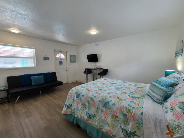 Imagen de la habitación del Hotel Sun Island Motel. Foto 13