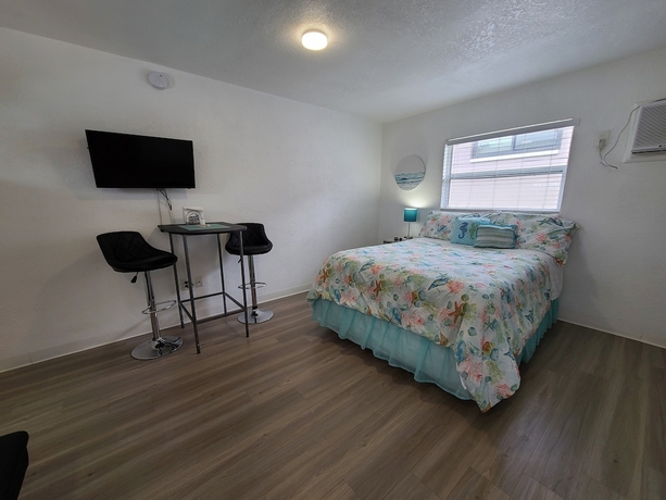 Imagen de la habitación del Hotel Sun Island Motel. Foto 16