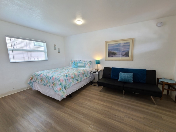 Imagen de la habitación del Hotel Sun Island Motel. Foto 19