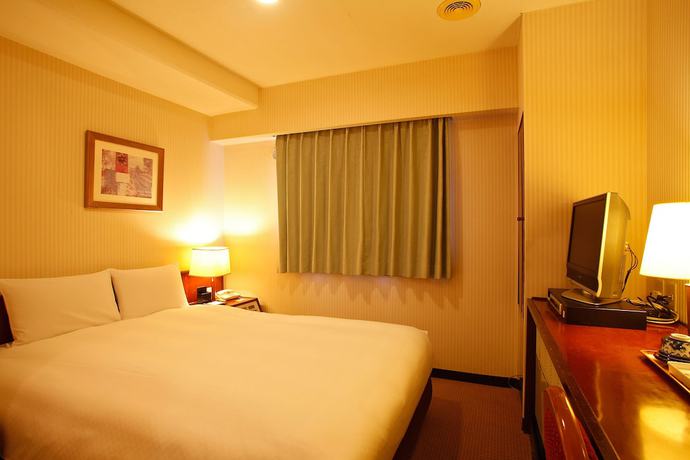 Imagen de la habitación del Hotel Sun Members Tokyo Shinjuku. Foto 11