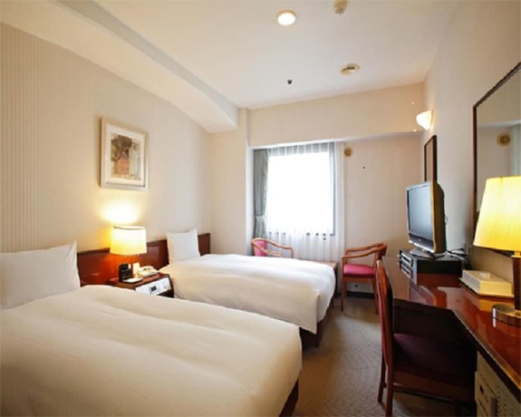 Imagen de la habitación del Hotel Sun Members Tokyo Shinjuku. Foto 12
