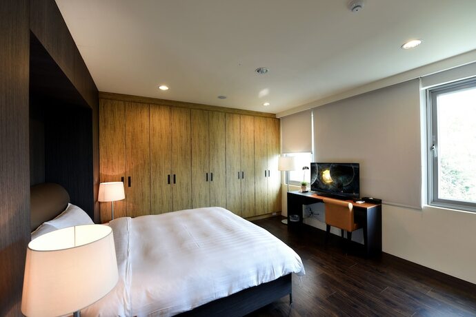 Imagen de la habitación del Hotel Sun Moon Lake Bamboo Rock Garden. Foto 20