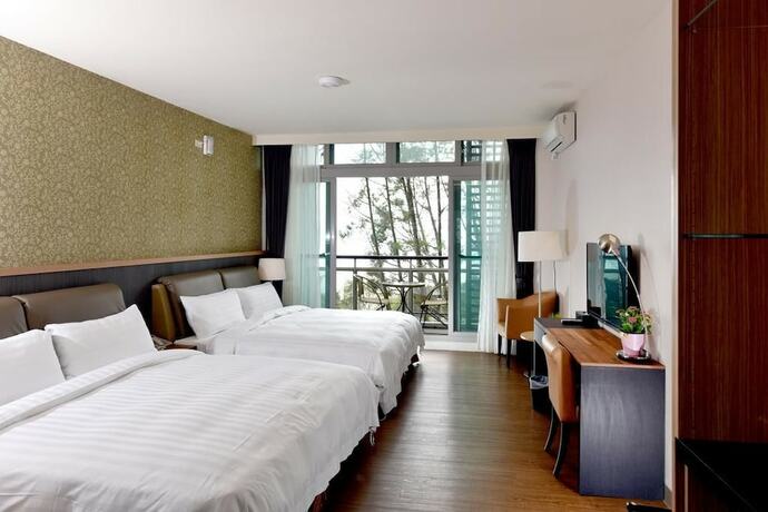 Imagen de la habitación del Hotel Sun Moon Lake Bamboo Rock Garden. Foto 26