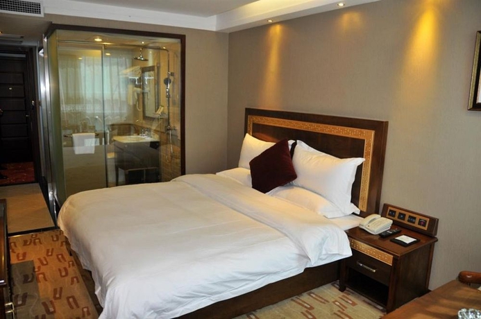 Imagen de la habitación del Hotel Sun Moon Lake, DALIAN. Foto 2