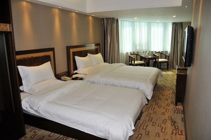Imagen de la habitación del Hotel Sun Moon Lake, DALIAN. Foto 8