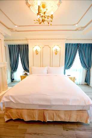 Imagen de la habitación del Hotel Sun Moon Lake Queen Castle. Foto 2
