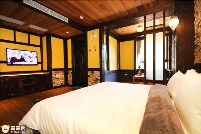 Imagen de la habitación del Hotel Sun Moon Lake Youngquan Hotels. Foto 11