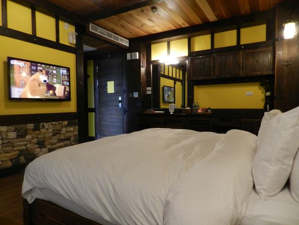Imagen de la habitación del Hotel Sun Moon Lake Youngquan Hotels. Foto 13