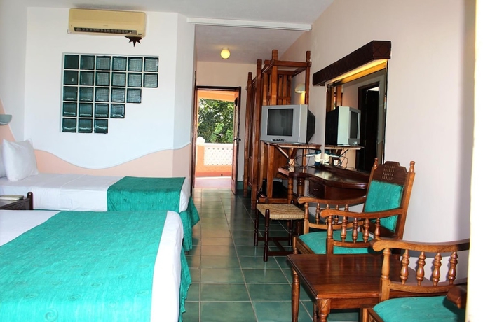 Imagen de la habitación del Hotel Sun N Sand Beach Resort. Foto 5