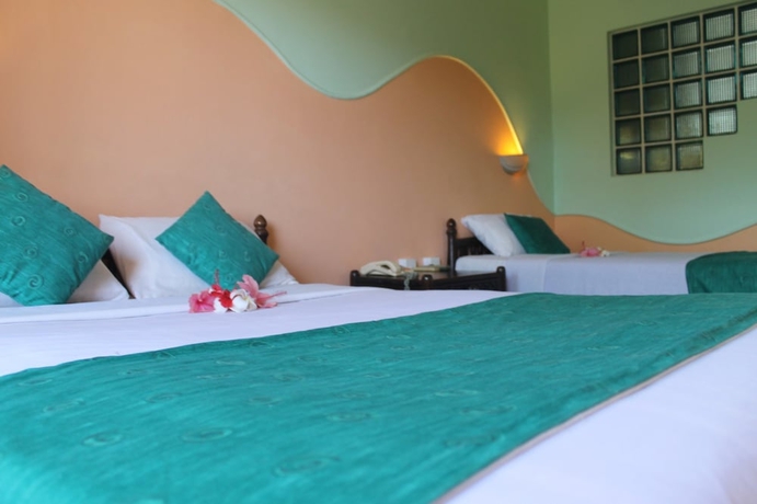 Imagen de la habitación del Hotel Sun N Sand Beach Resort. Foto 6
