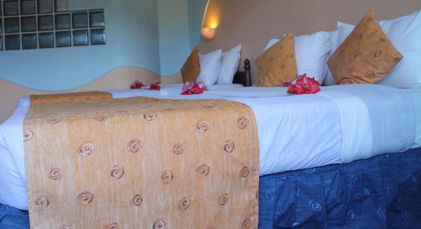 Imagen de la habitación del Hotel Sun N Sand Beach Resort. Foto 7
