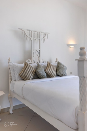 Imagen de la habitación del Hotel Sun N Sand Beach Resort. Foto 9