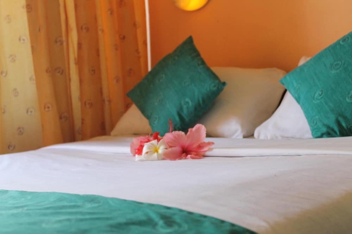 Imagen de la habitación del Hotel Sun N Sand Beach Resort. Foto 13