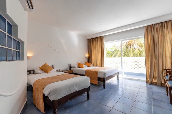 Imagen de la habitación del Hotel Sun N Sand Beach Resort. Foto 14