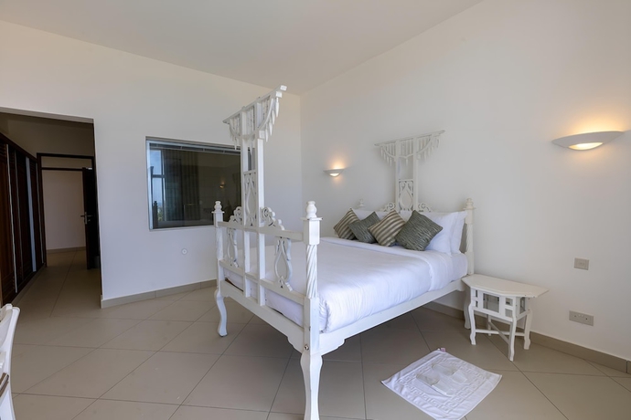 Imagen de la habitación del Hotel Sun N Sand Beach Resort. Foto 15