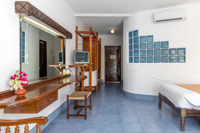 Imagen de la habitación del Hotel Sun N Sand Beach Resort. Foto 16