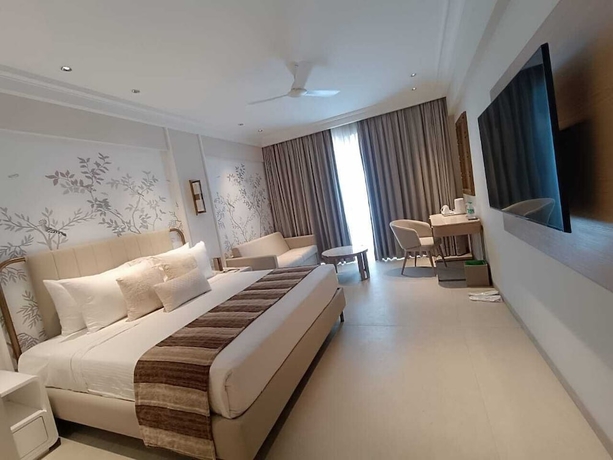 Imagen de la habitación del Hotel Sun N Sand Shirdi. Foto 7