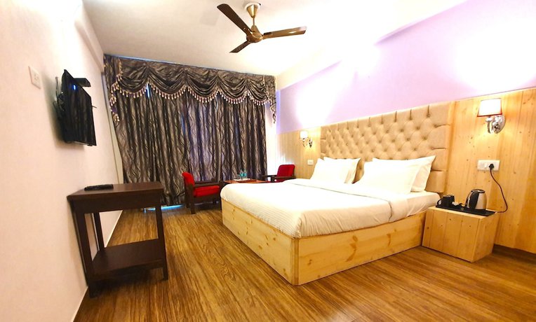 Imagen de la habitación del Hotel Sun N Snow Mussoorie. Foto 13