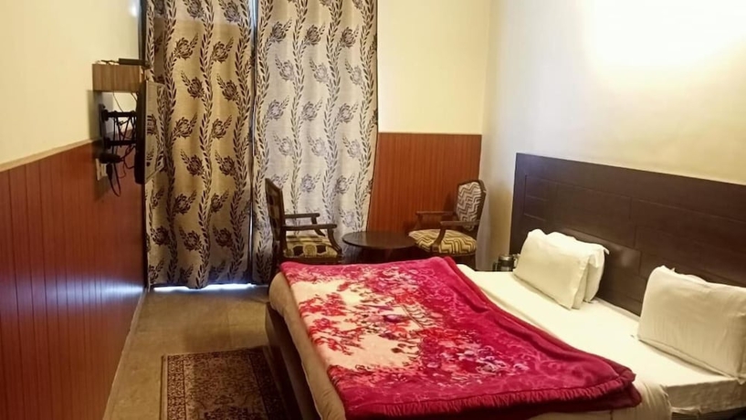 Imagen de la habitación del Hotel Sun N Star. Foto 16