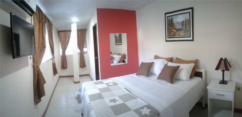 Imagen de la habitación del Hotel Sun Place Hosteria. Foto 2
