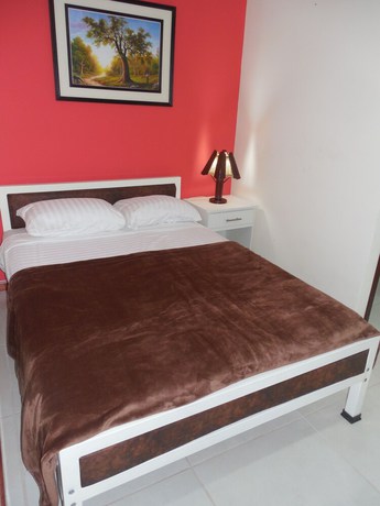 Imagen de la habitación del Hotel Sun Place Hosteria. Foto 3