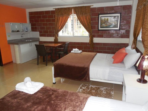 Imagen de la habitación del Hotel Sun Place Hosteria. Foto 9