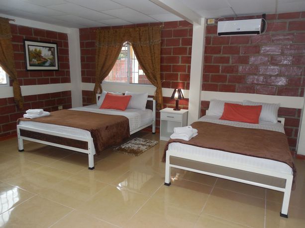 Imagen de la habitación del Hotel Sun Place Hosteria. Foto 15