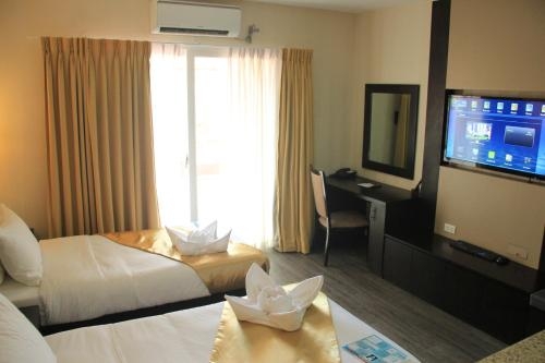 Imagen de la habitación del Hotel Sun Plaza Subic. Foto 6