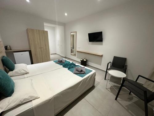 Imagen de la habitación del Hotel Sun Plaza Suites - Adults Only. Foto 6