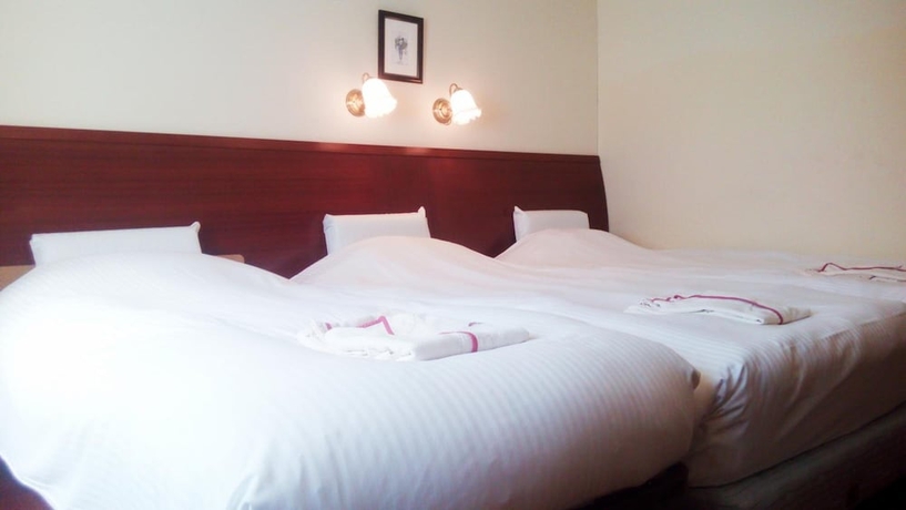 Imagen de la habitación del Hotel Sun Queen. Foto 15