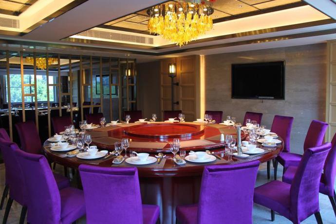 Imagen del bar/restaurante del Hotel Sun Shine Holiday Hotel Fuzhou. Foto 4