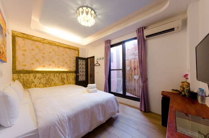 Imagen de la habitación del Hotel Sun Shune Pi Xiao Niuno Inn. Foto 21