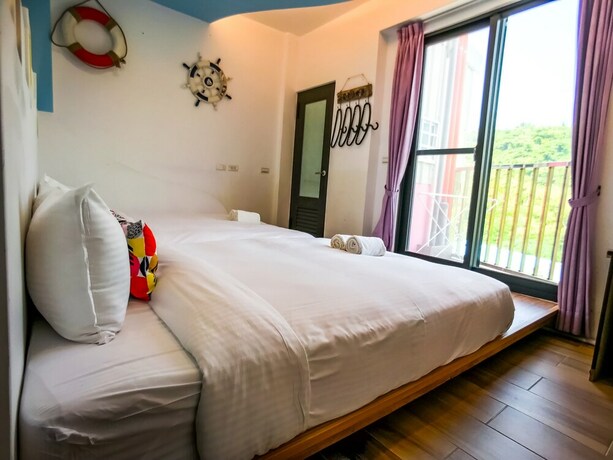 Imagen de la habitación del Hotel Sun Shune Pi Xiao Niuno Inn. Foto 34