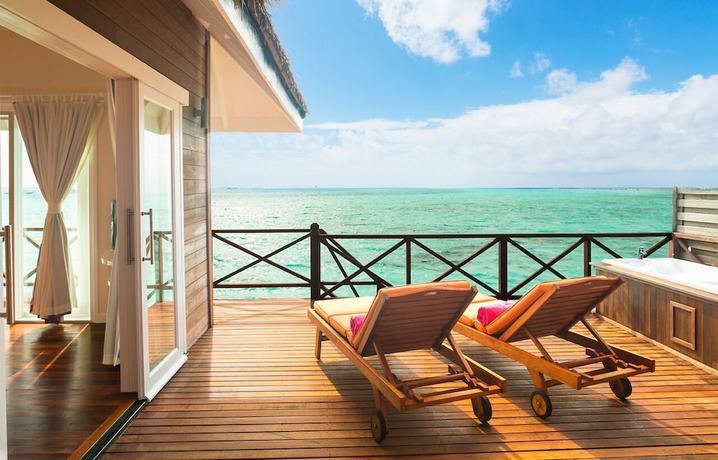 Imagen de la habitación del Hotel Sun Siyam Vilu Reef. Foto 11