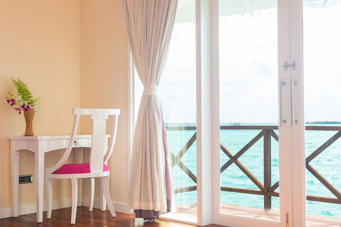 Imagen de la habitación del Hotel Sun Siyam Vilu Reef. Foto 15